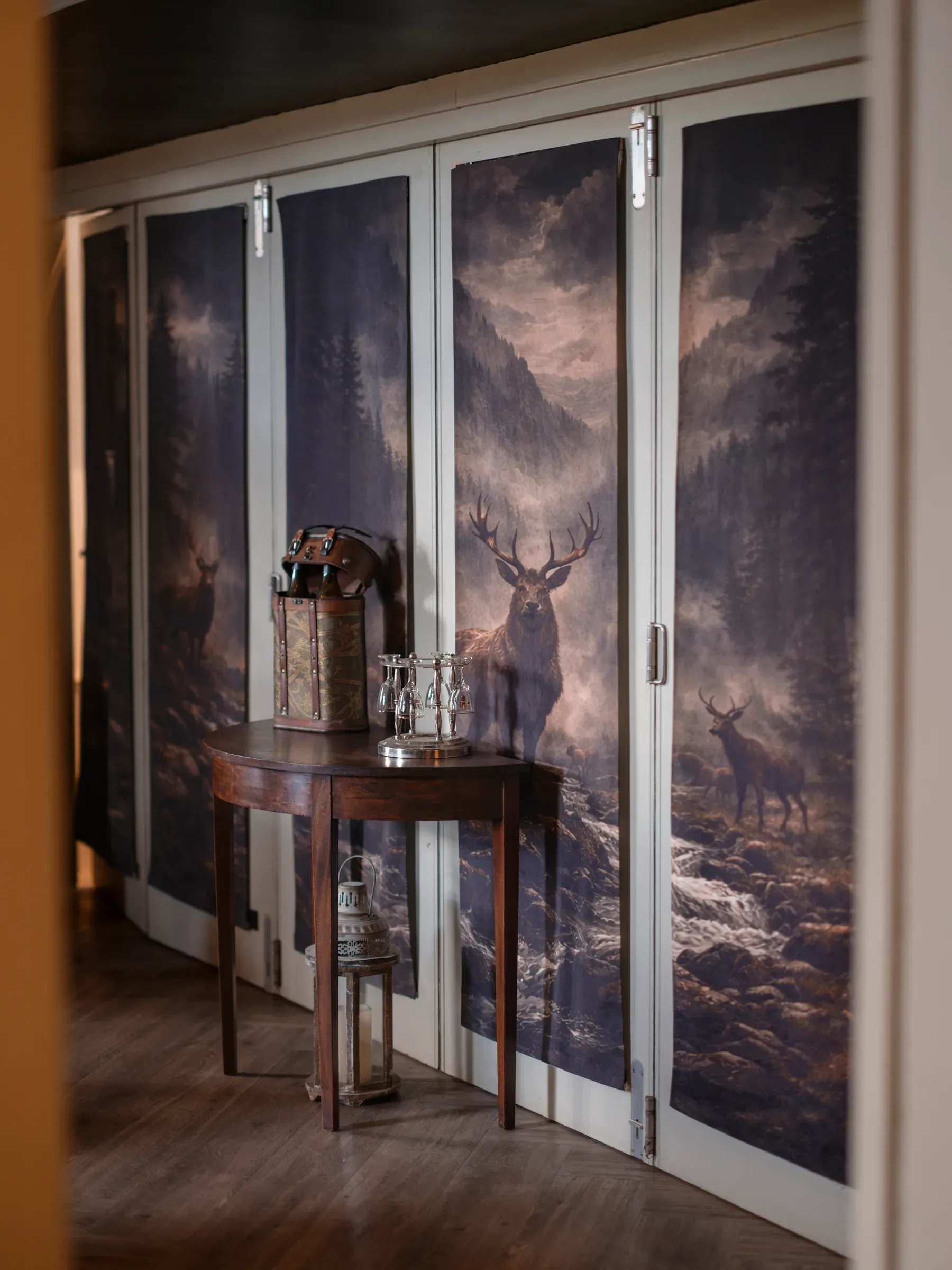 A vertical staging shot showcasing the elegant interior decor and scenic wall panels at the venue.