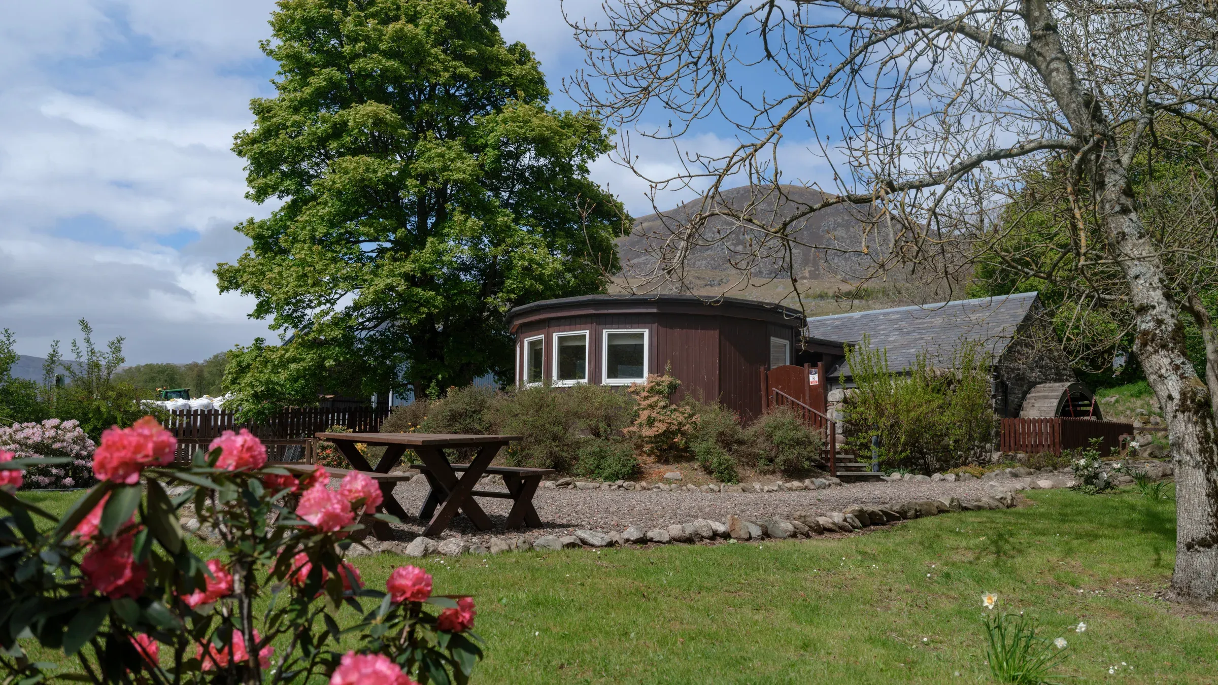 An exterior view of the Old Mill Lodge set within the scenic Glenclova grounds.